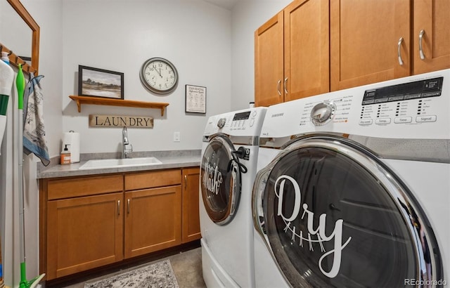 18926 W 94th Ave, Arvada, CO 80007 - laundry room with washer and dryer, cabinet space, and light tile patterned flooring