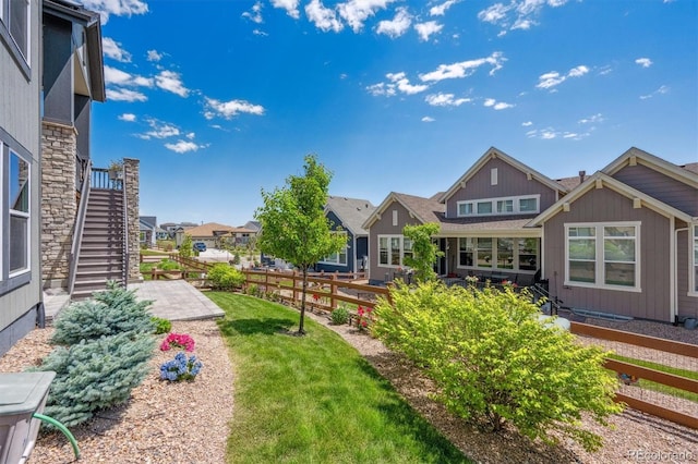 18926 W 94th Ave, Arvada, CO 80007 - view of yard with stairway and a residential view