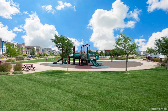 18926 W 94th Ave, Arvada, CO 80007 - community play area featuring a lawn and a residential view