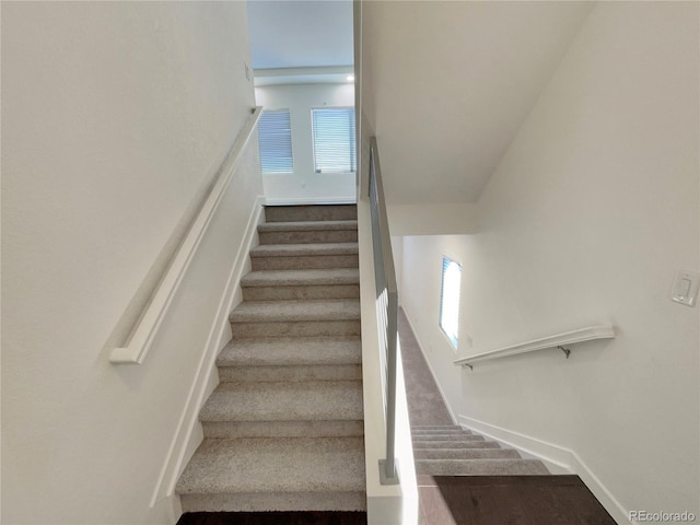 stairs featuring a wealth of natural light