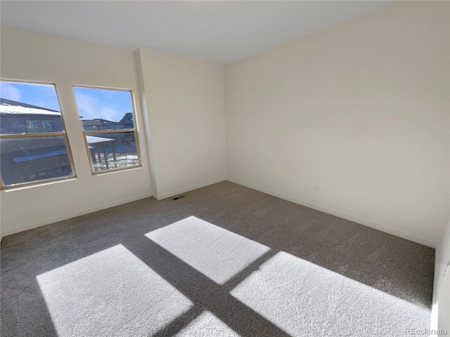 view of carpeted spare room