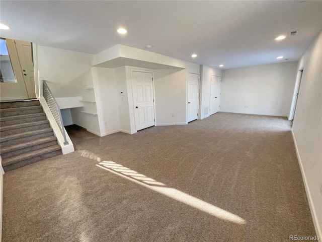 basement with dark carpet