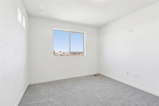 view of carpeted spare room