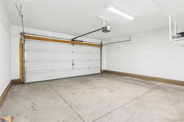 garage featuring a garage door opener