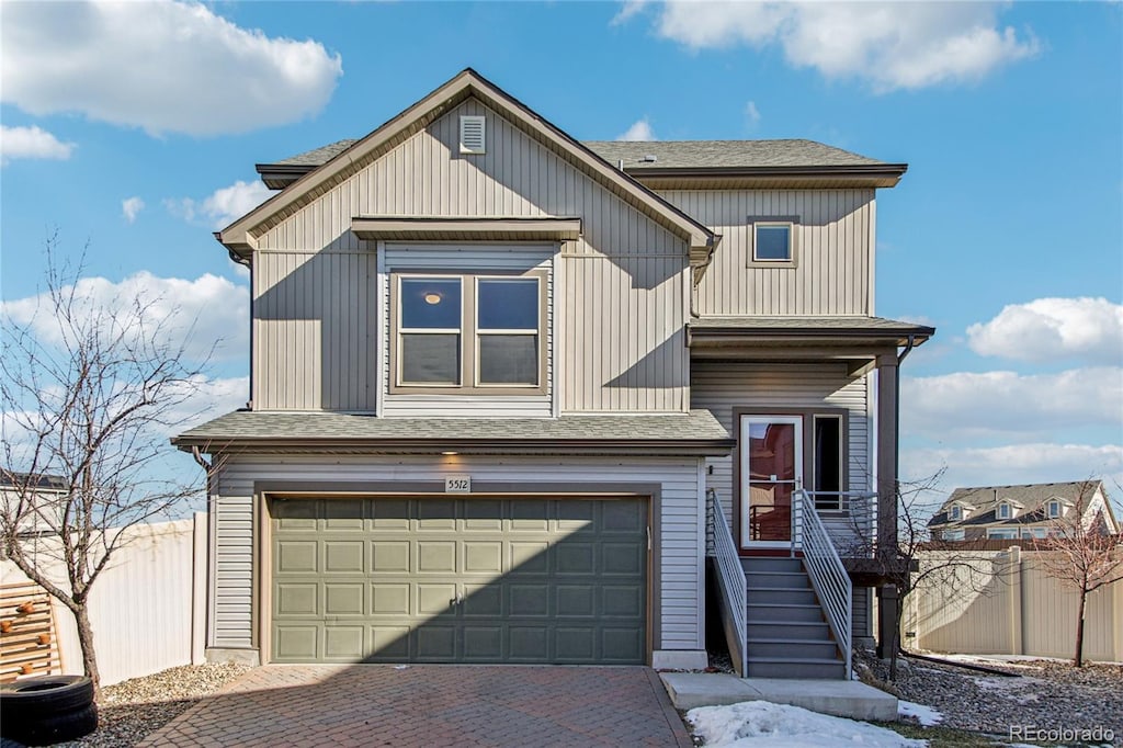 view of front of property with a garage