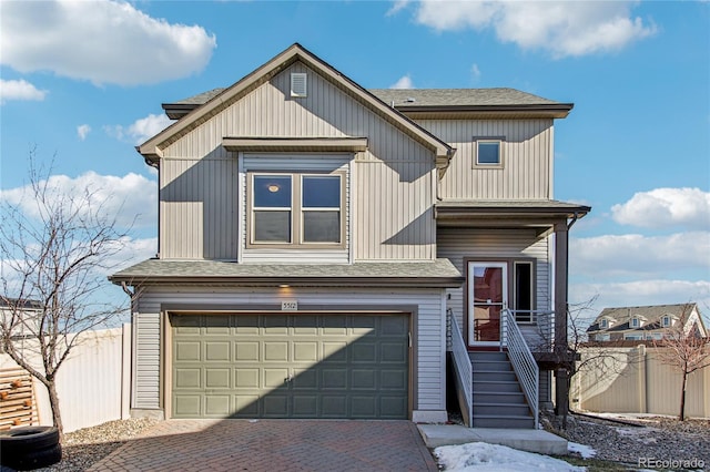 view of front of property with a garage