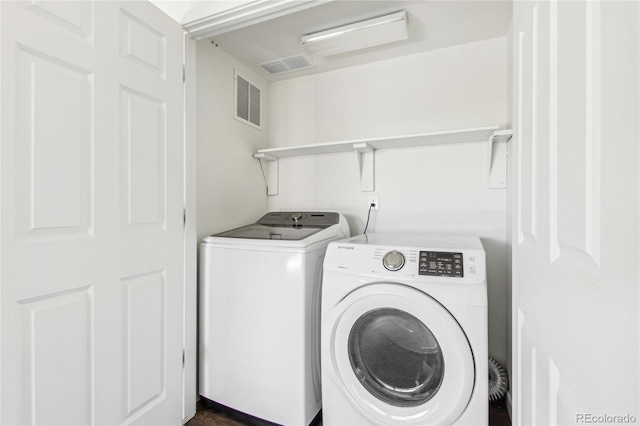 laundry area featuring independent washer and dryer