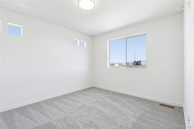 view of carpeted spare room