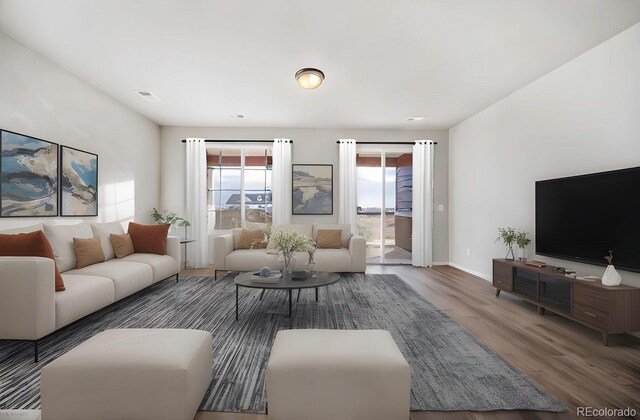 22384 E 49th Pl, Aurora, CO 80019 - living room with wood finished floors and baseboards