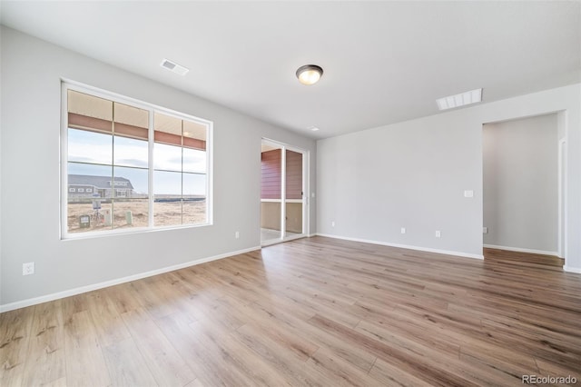 22384 E 49th Pl, Aurora, CO 80019 - spare room with wood finished floors and baseboards