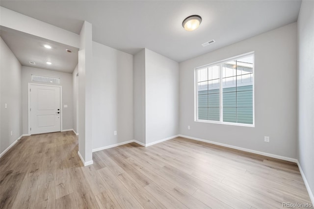 22384 E 49th Pl, Aurora, CO 80019 - unfurnished room with light wood-style flooring and baseboards