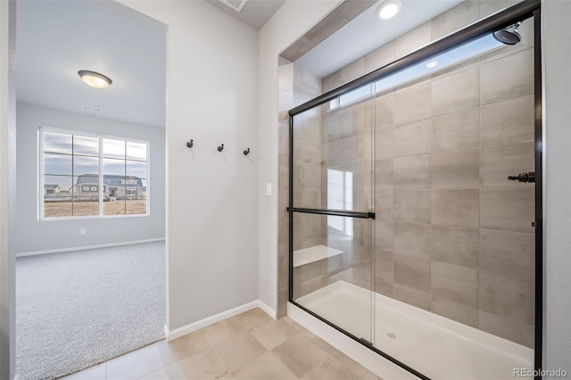 22384 E 49th Pl, Aurora, CO 80019 - full bathroom featuring a stall shower and tile patterned flooring