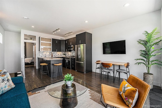 2103 W 32nd Ave Unit 10, Denver, CO 80211 - living room with dark wood-type flooring and recessed lighting