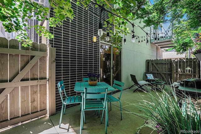 2103 W 32nd Ave Unit 10, Denver, CO 80211 - view of patio / terrace featuring outdoor dining space