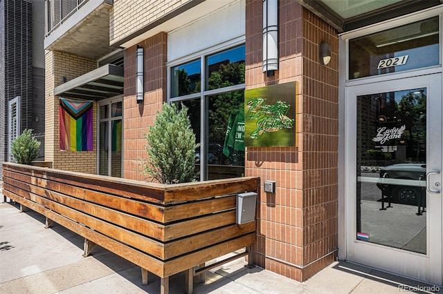 2103 W 32nd Ave Unit 10, Denver, CO 80211 - view of exterior entry featuring brick siding