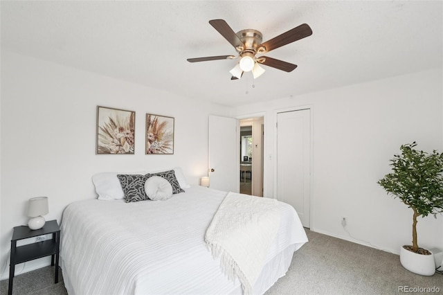 2393 E 90th Ave, Thornton, CO 80229 - bedroom with carpet, ceiling fan, a closet, and baseboards