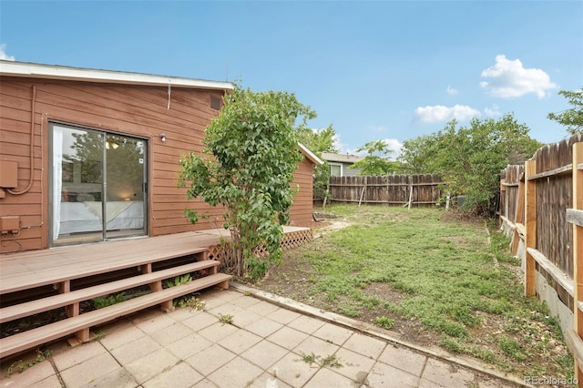 2393 E 90th Ave, Thornton, CO 80229 - fenced backyard featuring a deck and a patio
