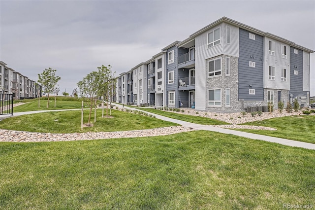 16841 Askins Loop Unit 105, Parker, CO 80134 - view of building exterior featuring cooling unit