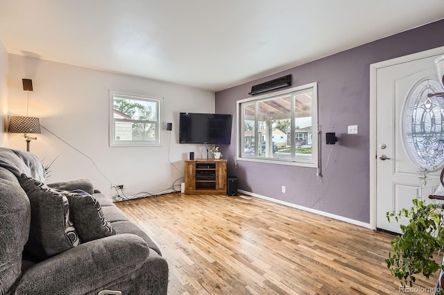 1254 S Osceola St, Denver, CO 80219 - living area with baseboards and hardwood / wood-style flooring