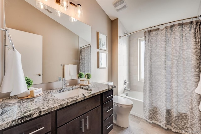 full bathroom with toilet, vanity, lofted ceiling, and shower / tub combo with curtain