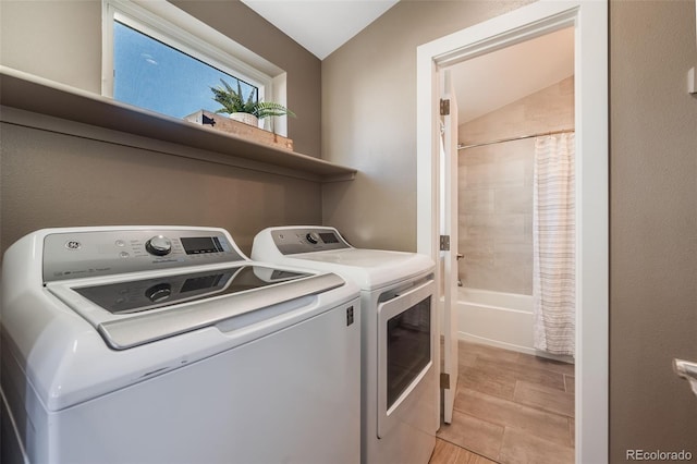 washroom featuring separate washer and dryer