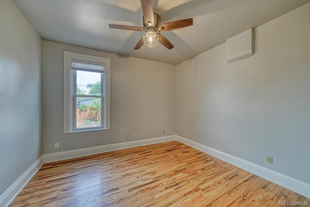 144 N C St, Salida, CO 81201 - empty room with wood finished floors, ceiling fan, and baseboards