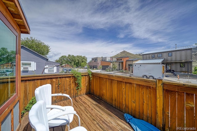 144 N C St, Salida, CO 81201 - wooden deck featuring a residential view