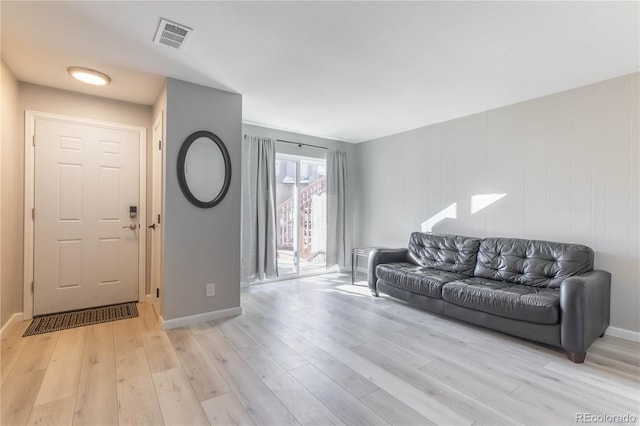 living room featuring light wood-type flooring