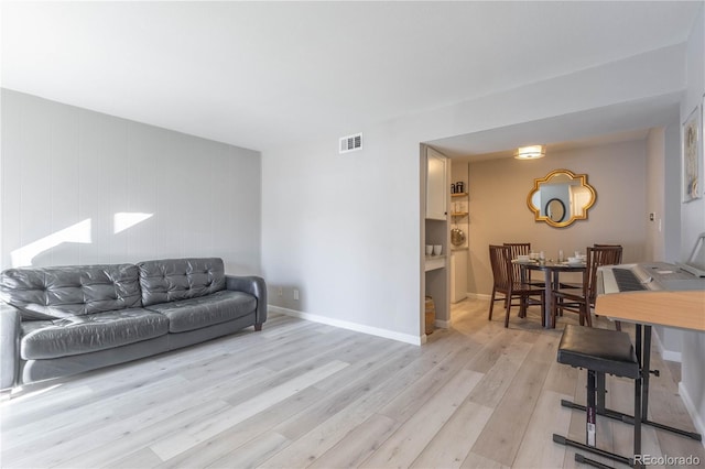 living room with light wood-type flooring