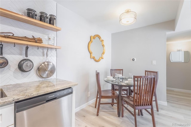 dining area with light wood-type flooring