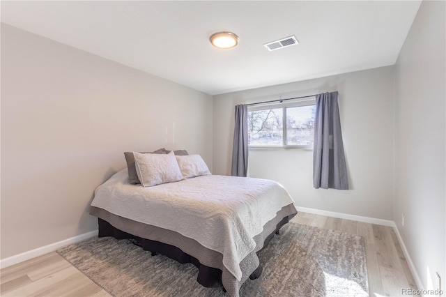 bedroom featuring light wood-type flooring