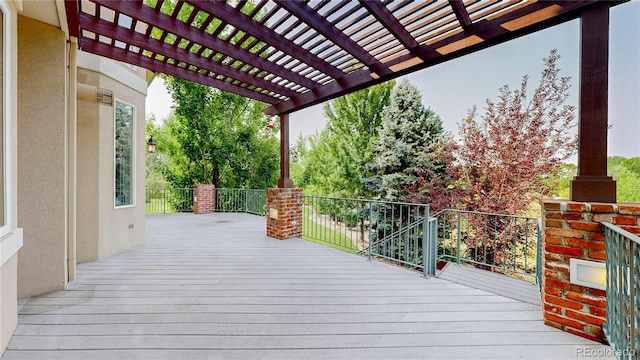 wooden deck with a pergola