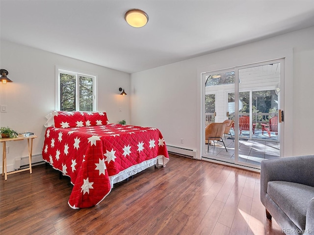 bedroom with access to exterior, hardwood / wood-style floors, and a baseboard radiator