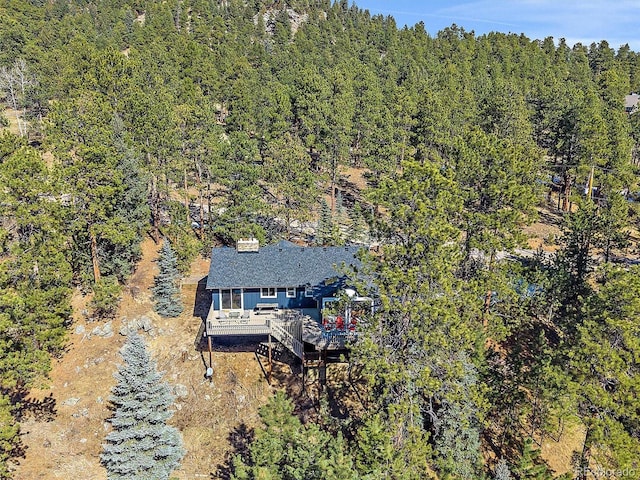 bird's eye view featuring a view of trees