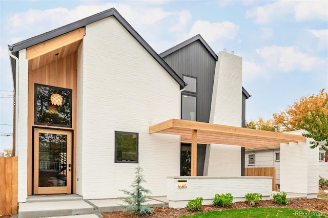 exterior space featuring a chimney