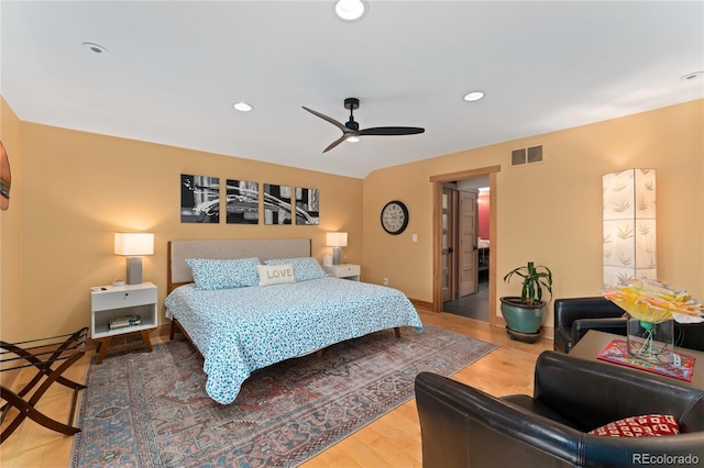 3313 Curtis St, Denver, CO 80205 - bedroom with recessed lighting, wood finished floors, and ceiling fan