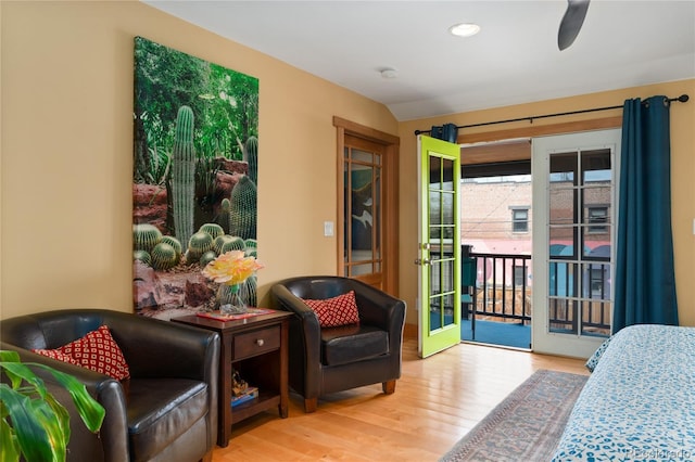 3313 Curtis St, Denver, CO 80205 - bedroom featuring access to exterior, wood finished floors, and recessed lighting