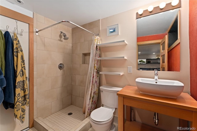 3313 Curtis St, Denver, CO 80205 - bathroom featuring toilet, a shower stall, and vanity