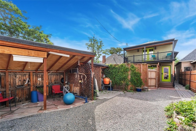 3313 Curtis St, Denver, CO 80205 - view of patio / terrace featuring a gate