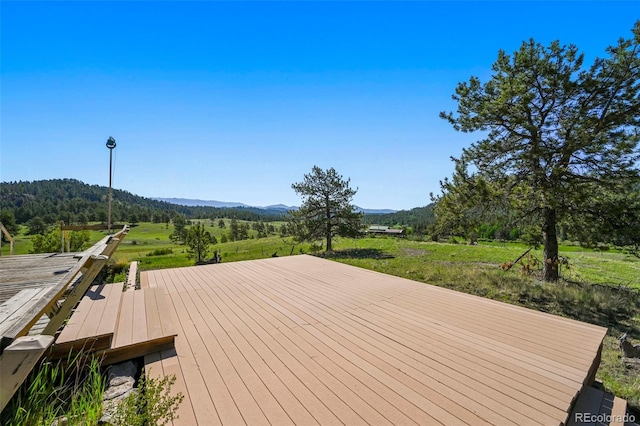 332 Valley Cir, Guffey, CO 80820 - wooden deck with a mountain view