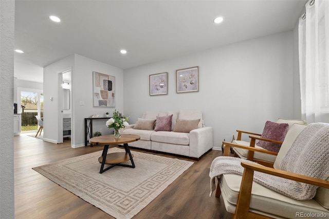 13438 E 13th Pl, Aurora, CO 80011 - living area featuring baseboards, recessed lighting, and wood finished floors