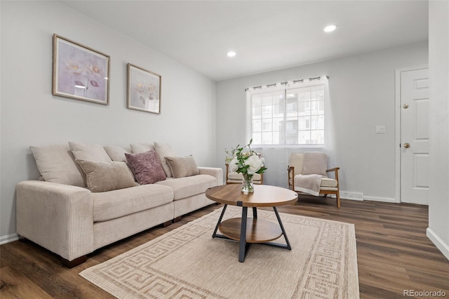 13438 E 13th Pl, Aurora, CO 80011 - living room featuring recessed lighting, baseboards, and dark wood-style floors