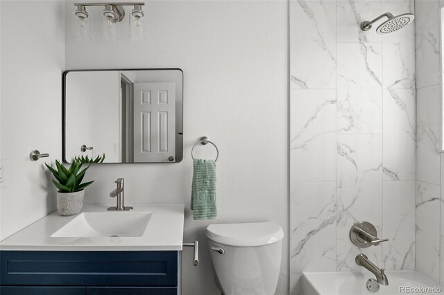 13438 E 13th Pl, Aurora, CO 80011 - full bath featuring toilet,  shower combination, and vanity