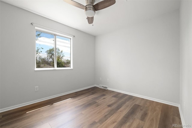 13438 E 13th Pl, Aurora, CO 80011 - empty room with a ceiling fan, baseboards, visible vents, and wood finished floors