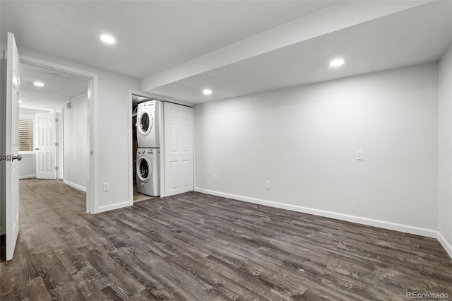 13438 E 13th Pl, Aurora, CO 80011 - finished basement featuring stacked washing maching and dryer, baseboards, recessed lighting, and dark wood-style flooring