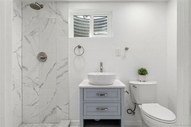13438 E 13th Pl, Aurora, CO 80011 - full bath with toilet, a marble finish shower, and vanity
