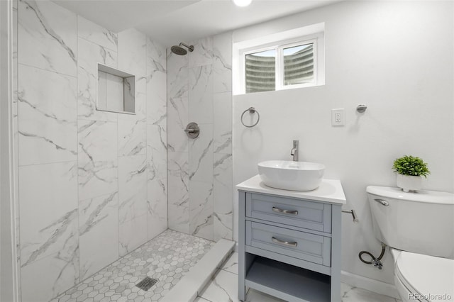 13438 E 13th Pl, Aurora, CO 80011 - full bathroom featuring toilet, a marble finish shower, marble finish floor, and vanity