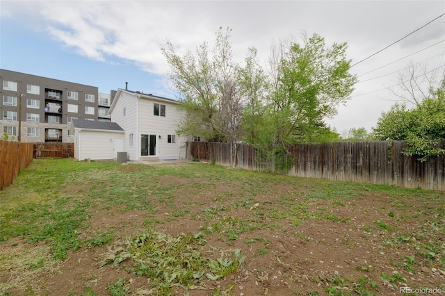 13438 E 13th Pl, Aurora, CO 80011 - view of yard with a fenced backyard and central AC unit
