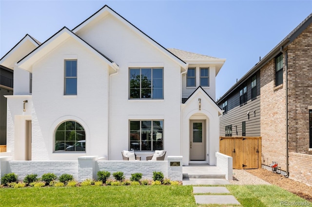 4131 Quivas St, Denver, CO 80211 - view of front of house featuring brick siding and a gate