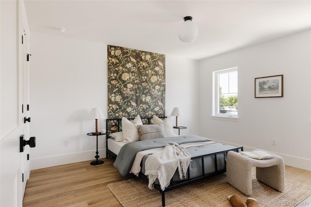 4131 Quivas St, Denver, CO 80211 - bedroom with light wood-style flooring and baseboards